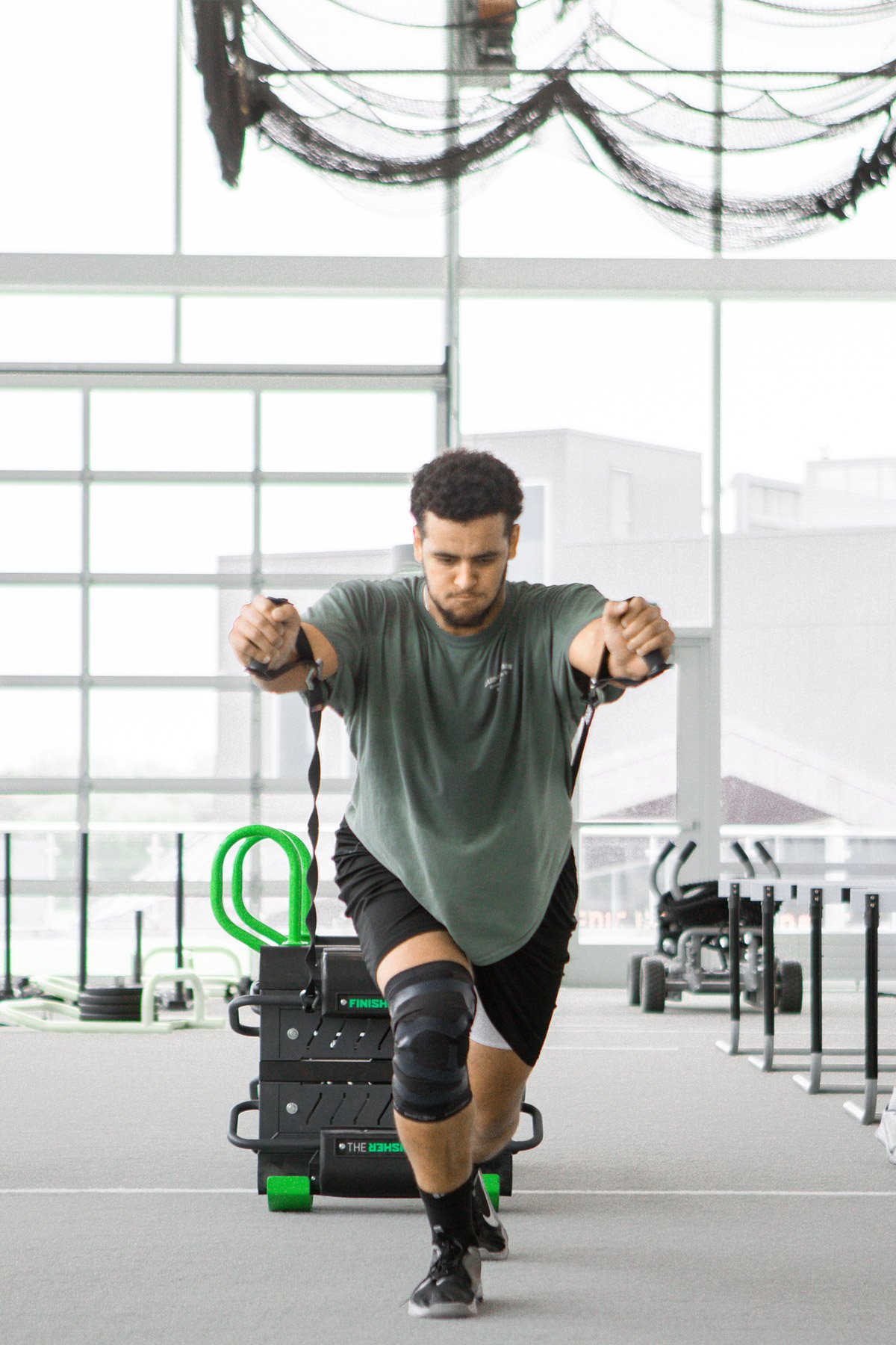 Football Player Working out with FlipSled