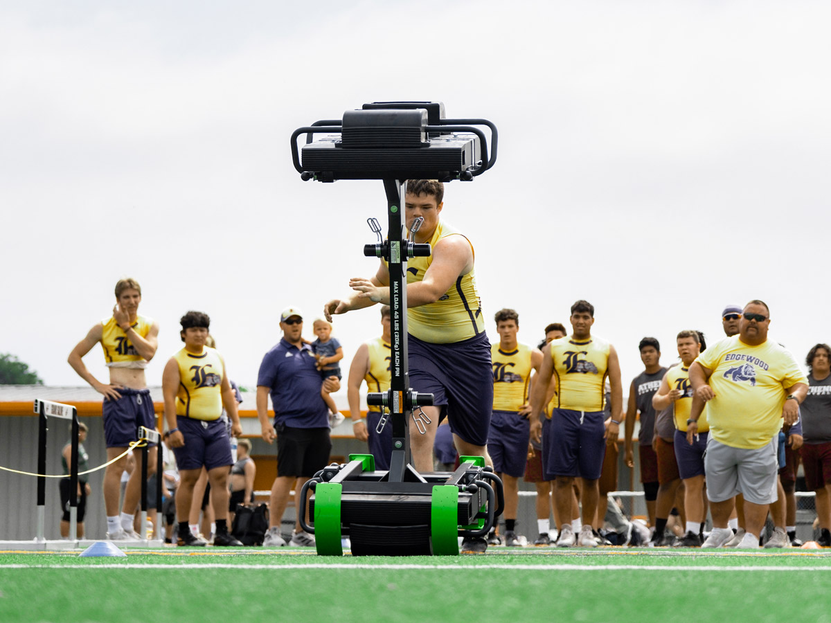 Football Player Practicing with FlipSled